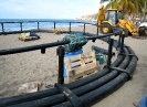 Préparation d'une cage flottante avant mise à l'eau